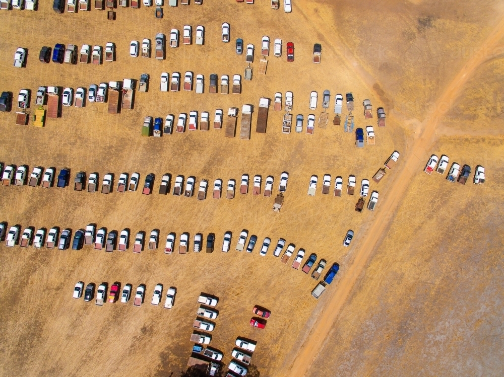 vehicles lined up and parked at a rural event - Australian Stock Image