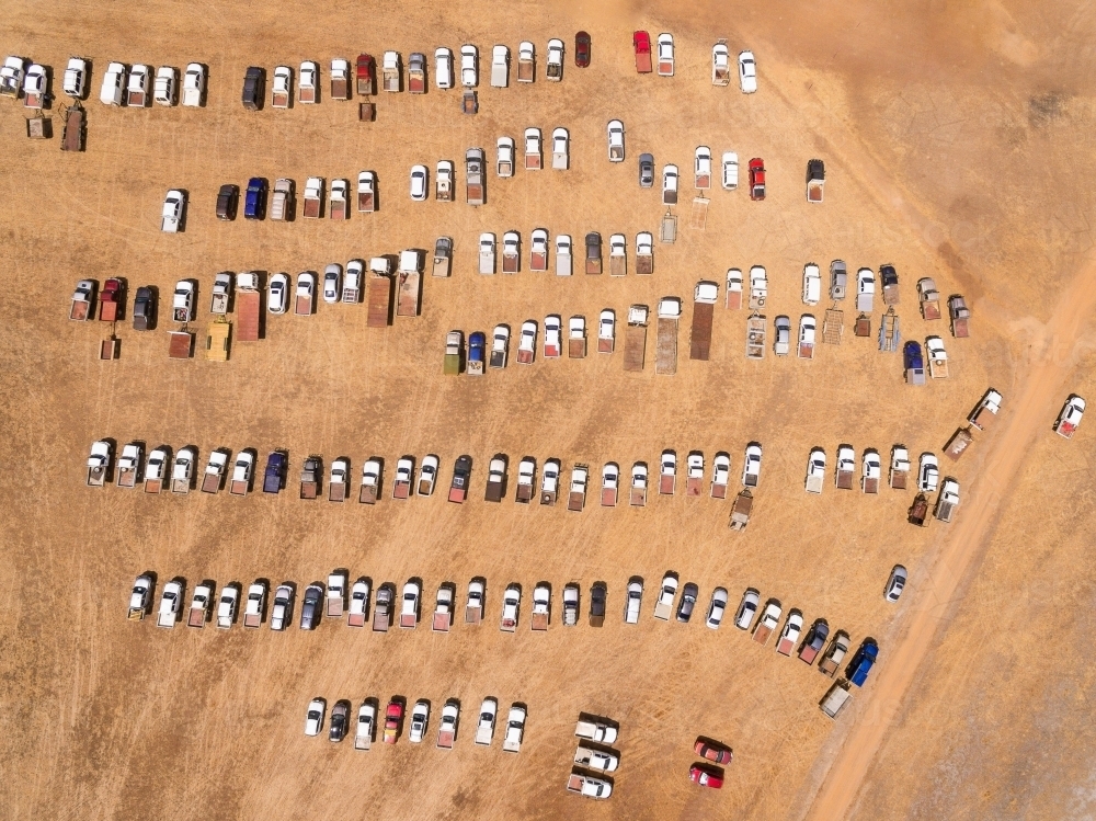 vehicles lined up and parked at a rural event - Australian Stock Image