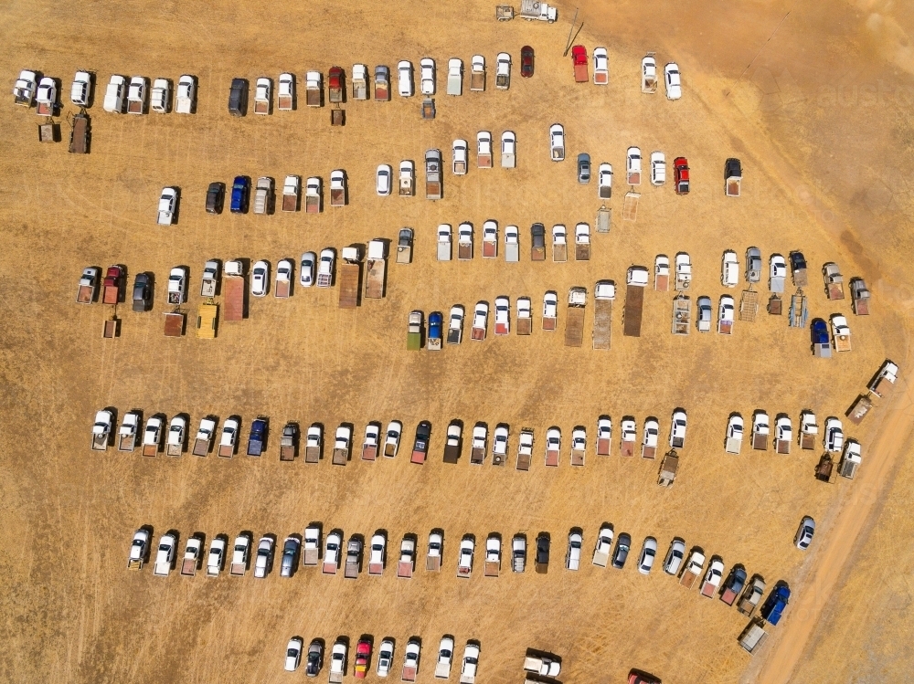 vehicles lined up and parked at a rural event - Australian Stock Image