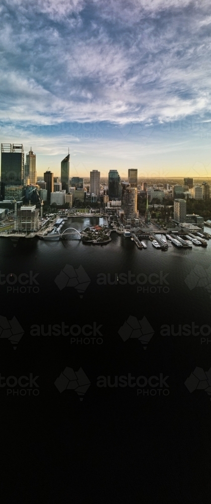 Vertical aerial view of Perth cityscape across Swan River - Australian Stock Image