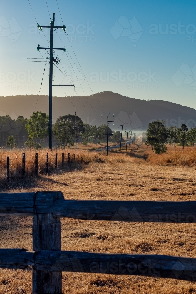 Vertical shot of power lines in Mount Morgan - Australian Stock Image