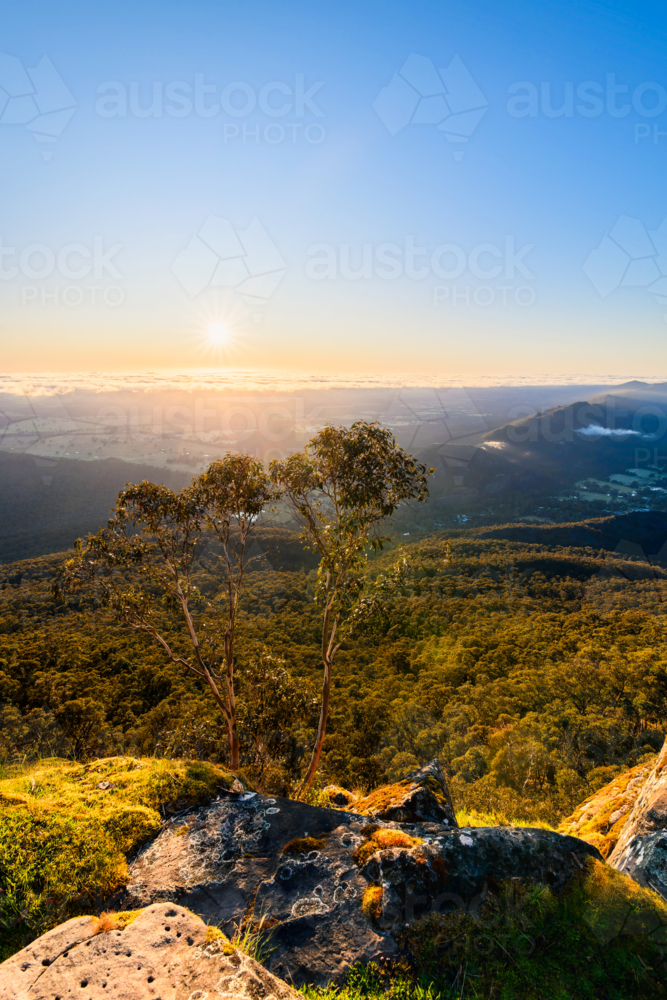 Vertical sunrise view from Boroka Lookout towards Halls Gap, Grampians, Victoria, Australia - Australian Stock Image