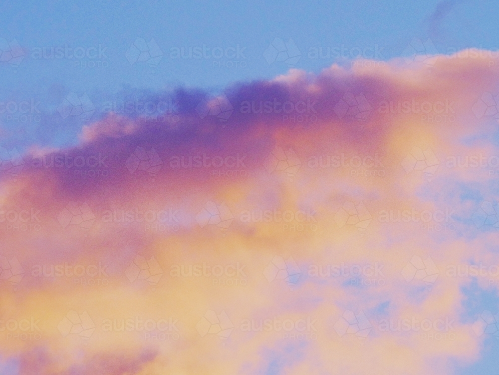 vibrant pastel clouds at sunset - Australian Stock Image