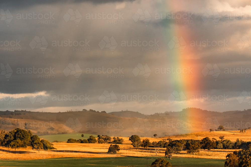 Vibrant rainbow in rural New South Wales - Australian Stock Image