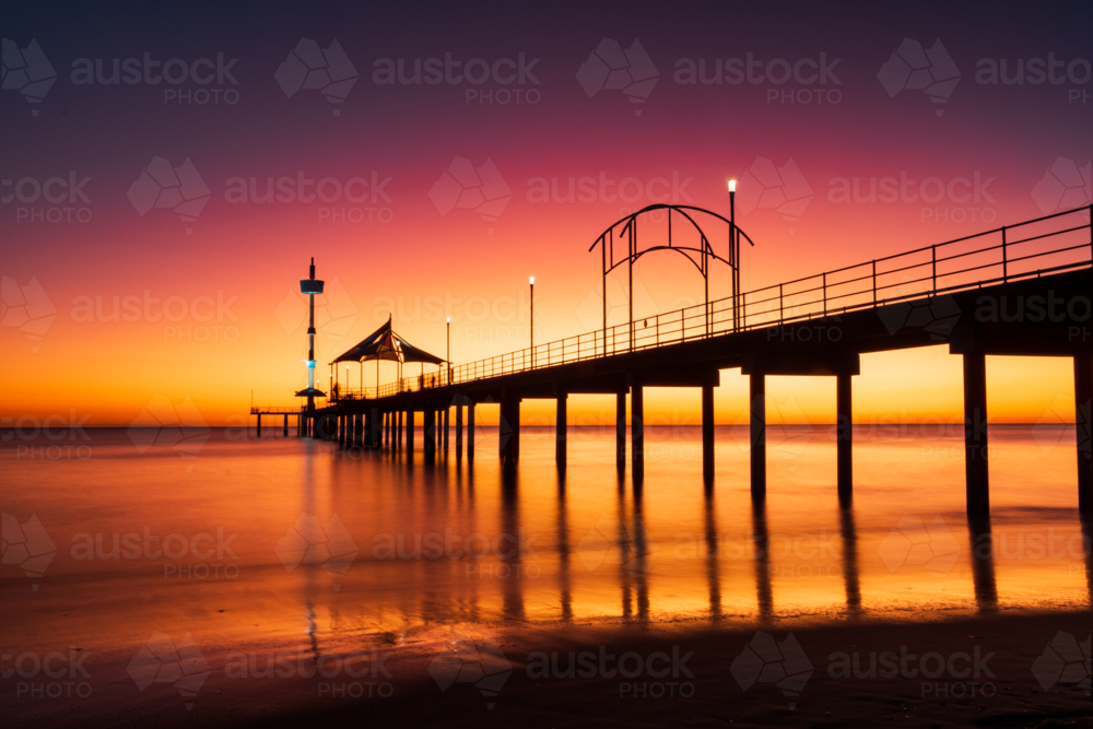Vibrant Twilight over the Iconic Brighton Jetty in Adelaide, South Australia - Australian Stock Image
