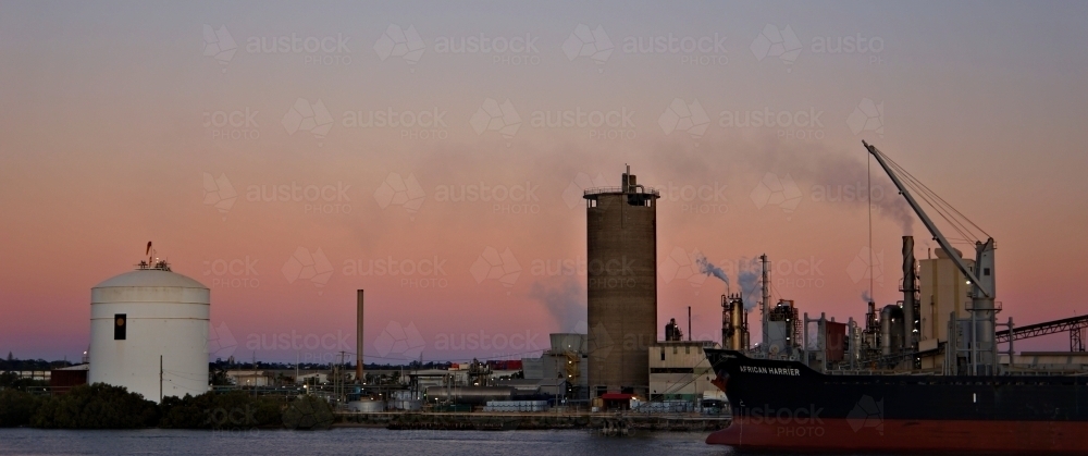 Vibrant winters sky by the boat port - Australian Stock Image