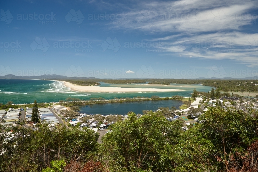 View above caravan park next to estuary - Australian Stock Image