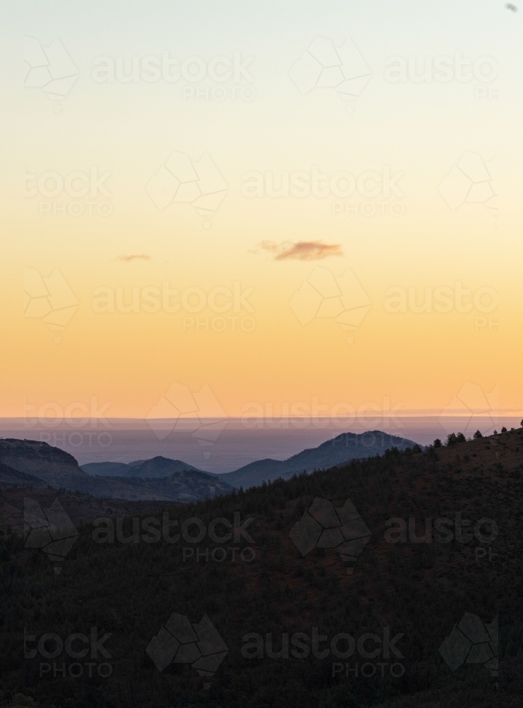 view across hills at sunset - Australian Stock Image