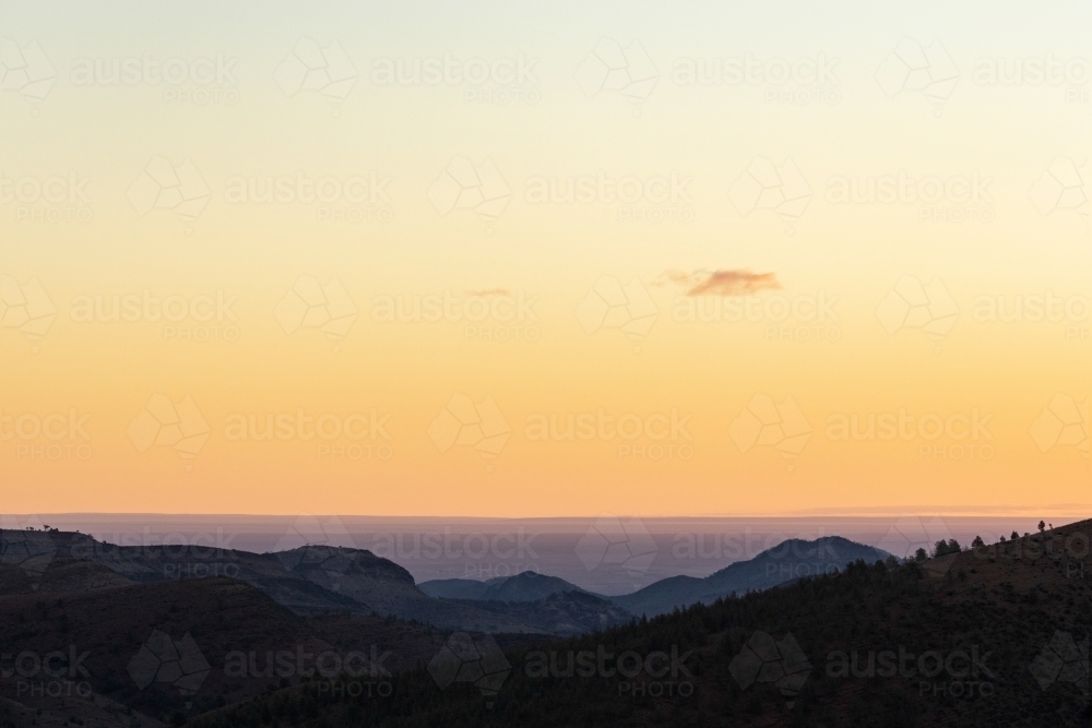 view across hills at sunset - Australian Stock Image