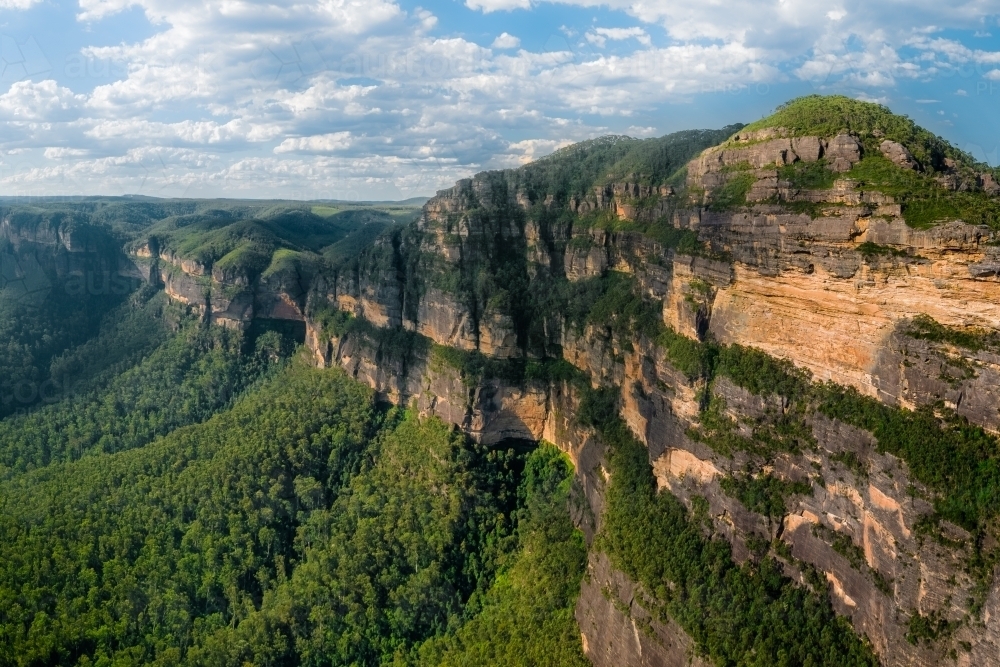 View down the Grose Valley in the NSW Blue Mountains with Mount Banks in foreground - Australian Stock Image