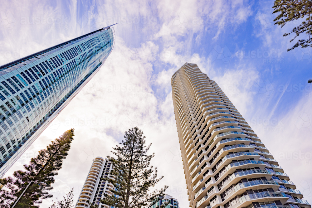 View from below of Q1, the tallest building on the Gold Coast, towering over other skyscrapers - Australian Stock Image