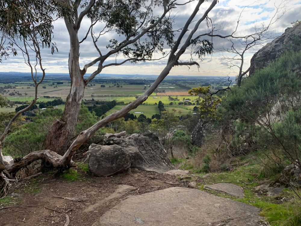 View from Hanging rock with dappled sunlight - Australian Stock Image