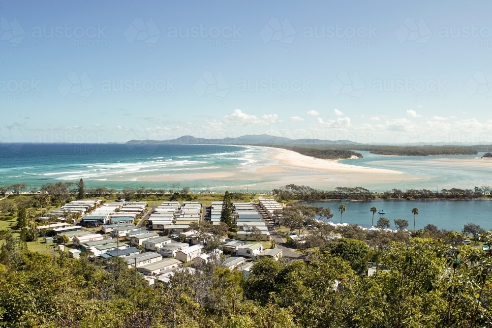 View from lookout overlooking caravan park, lagoon and inlet - Australian Stock Image