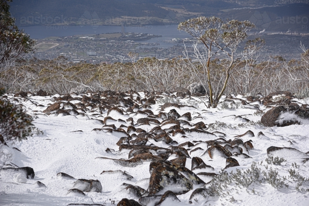 view from MT Wellington over Hobart in Winter snow - Australian Stock Image