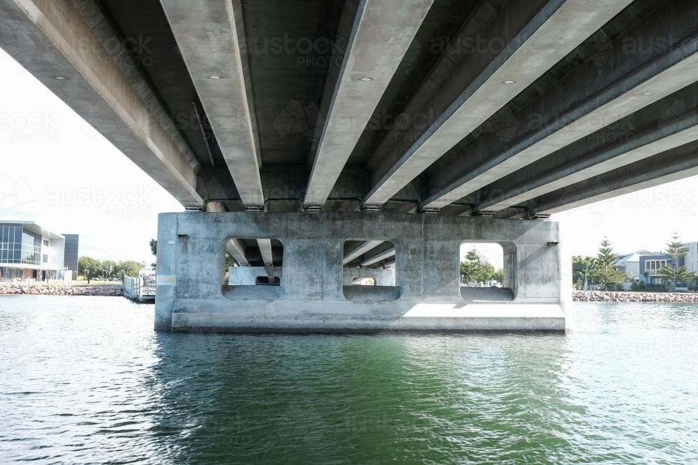 View from the harbour underneath concrete bridge - Australian Stock Image