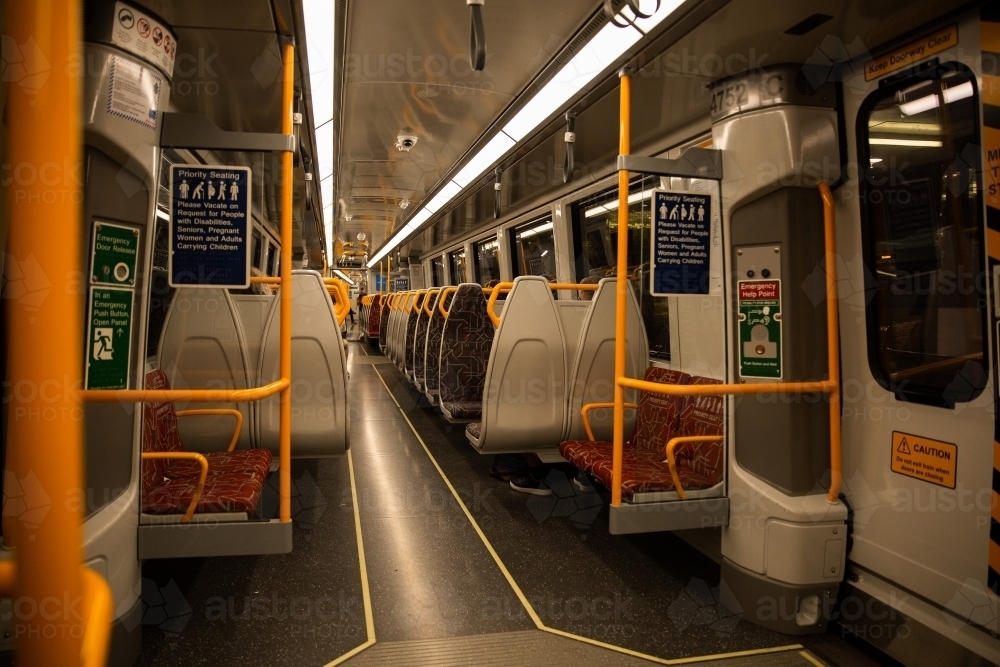 view inside a a train carriage at night - Australian Stock Image