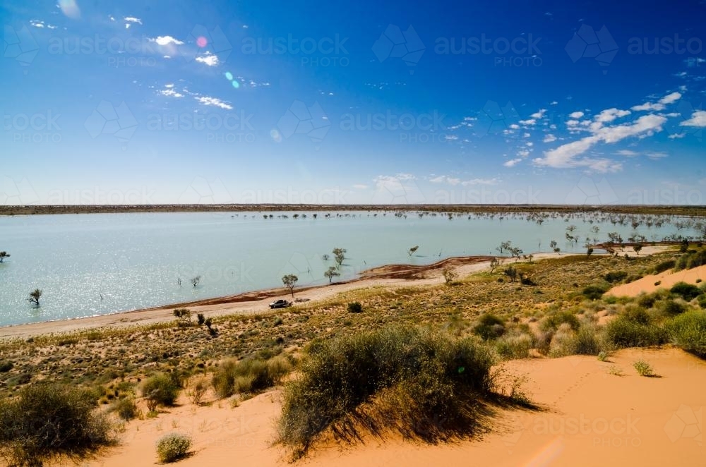 View of a lake that formed beside Big Red in the Simpson Desert after a big wet season - Australian Stock Image