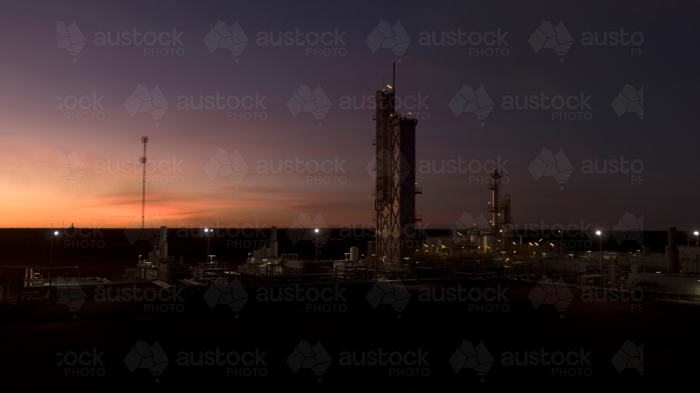 View of an industrial plant at sunrise - Australian Stock Image