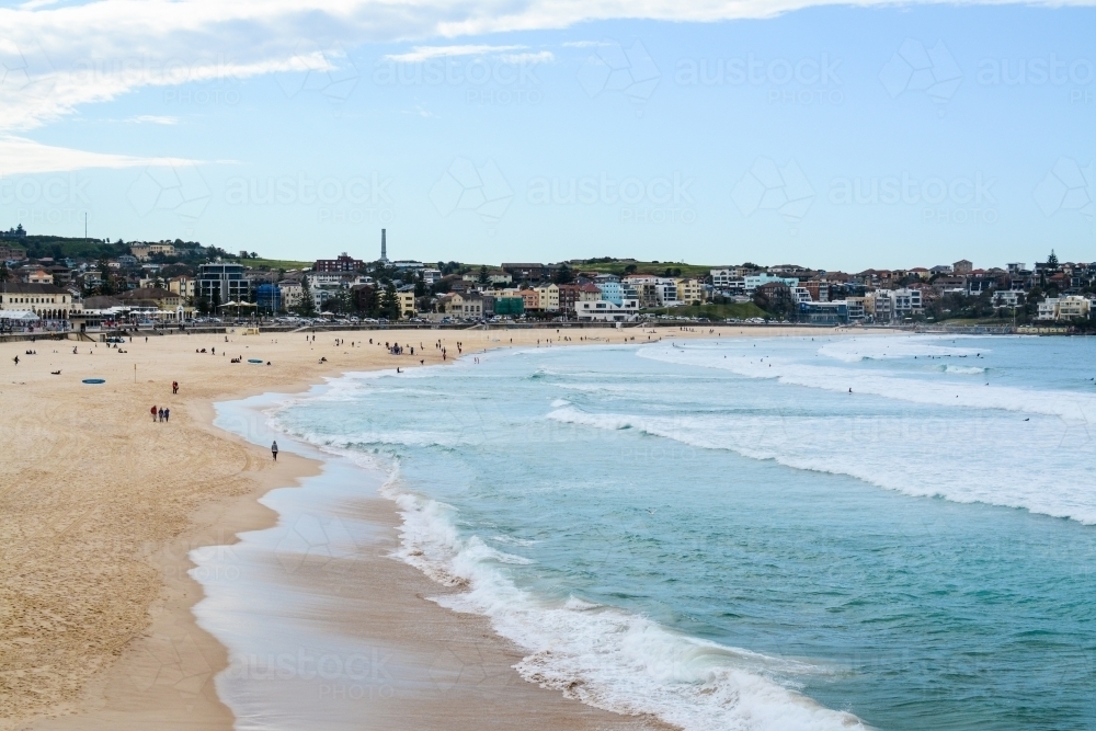 View of beach with lapping waves - Australian Stock Image