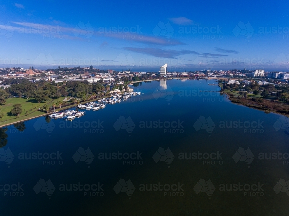 view of Bunbury city across the still water of the inlet - Australian Stock Image