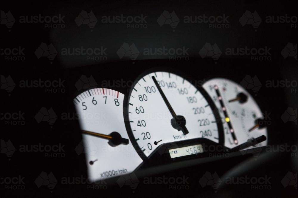View of car dash board at night - Australian Stock Image