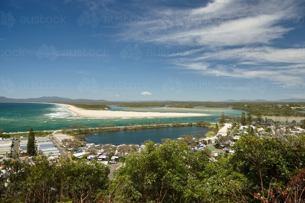 View above caravan park next to estuary - Australian Stock Image