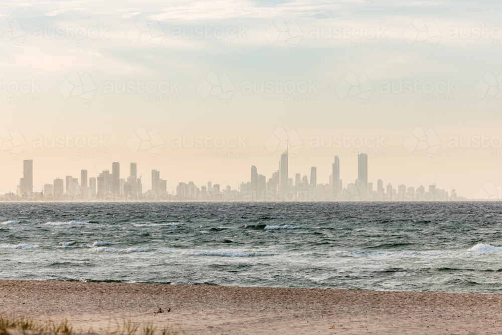 View of Gold Coast skyline across the water from Palm Beach - Australian Stock Image