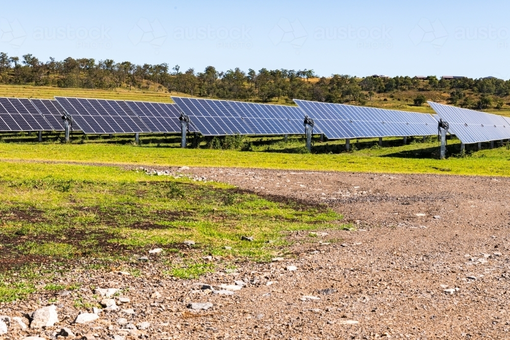 View of large scale solar farm in rural setting - Australian Stock Image