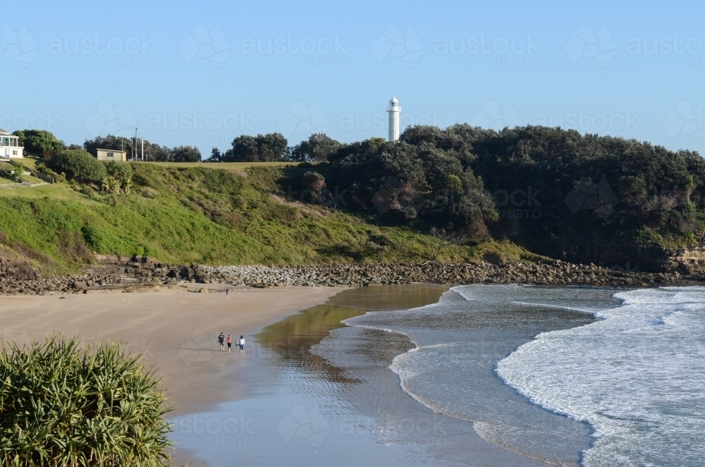Image Of View Of Main Beach Yamba With Family Walking Along Beach image-of-view-of-main-beach-yamba-with-family-walking-along-beach