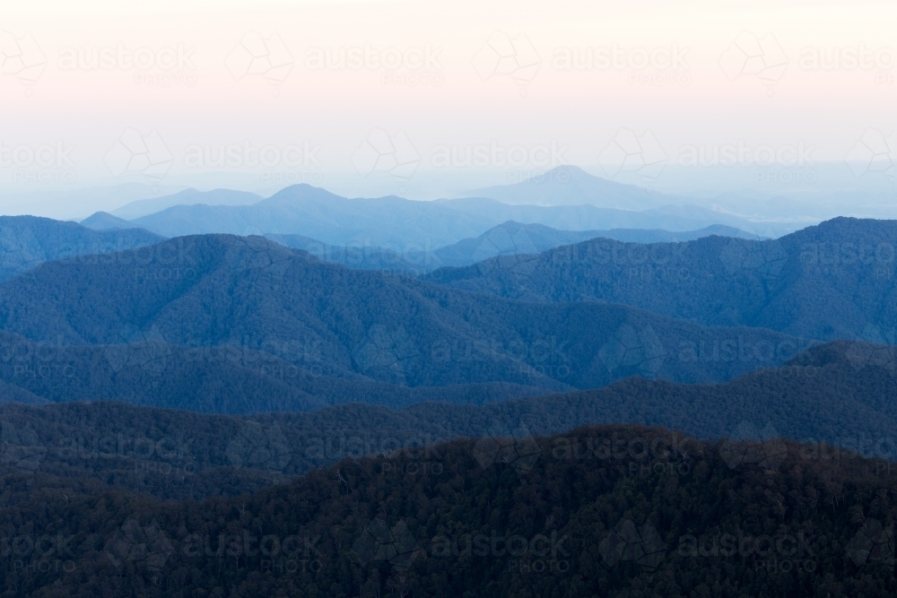 View of mountain ranges fading into the distance - Australian Stock Image