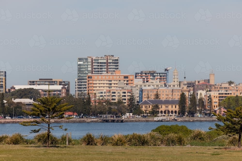 View of Newcastle city across the Hunter River from Stockton, NSW - Australian Stock Image