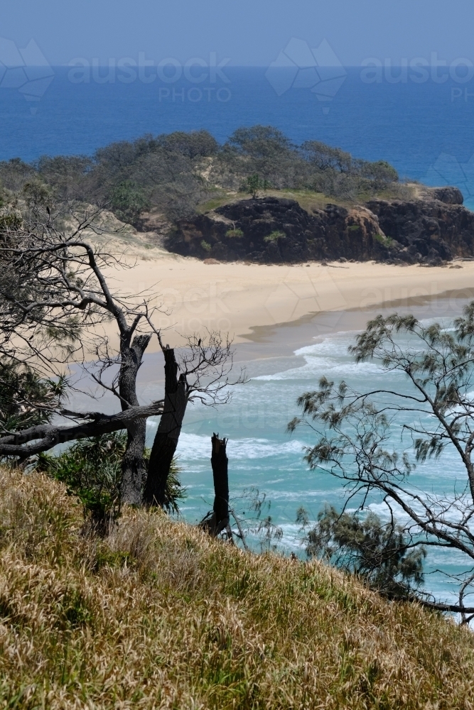 View of sand and sea from cliffs above Frenchmans Beach - Australian Stock Image