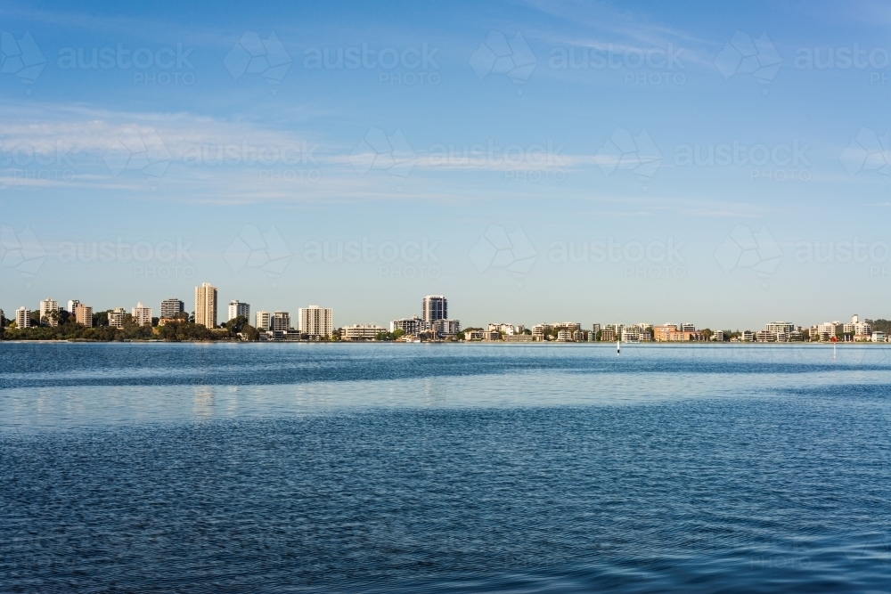 View of South Perth skyline across the tranquil blue Swan River Lake - Australian Stock Image