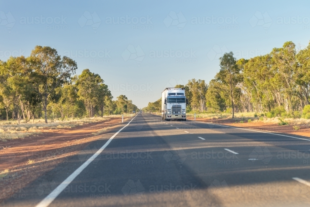 View of truck on road from passenger seat - Australian Stock Image