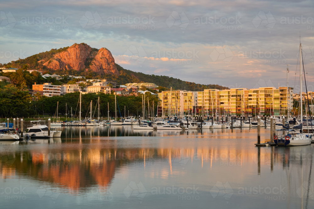 View over marina with boats towards Castle Hill, Townsville - Australian Stock Image