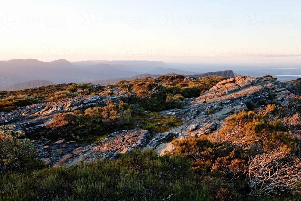 View over mountain range in late afternoon - Australian Stock Image