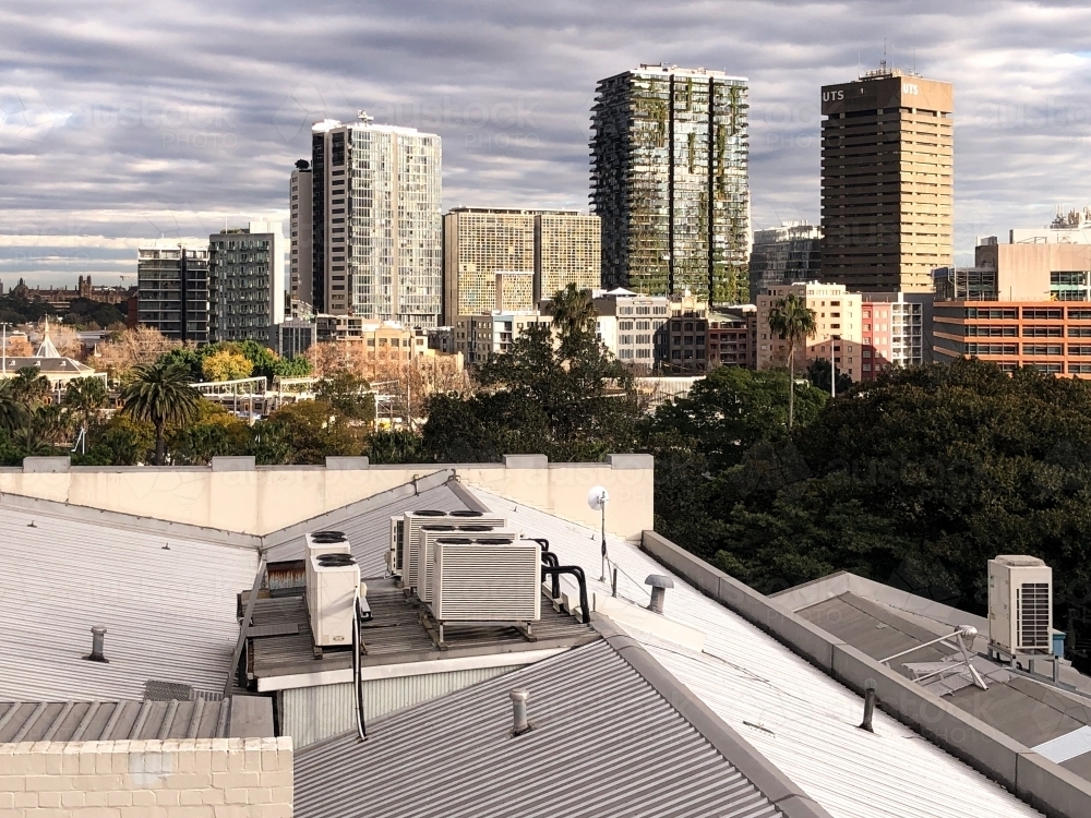 Image of View over roof to multiple high rise buildings in the city on ...