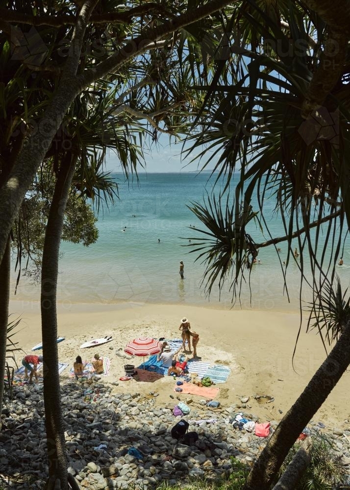 View through trees of Little Cove, Noosa - Australian Stock Image