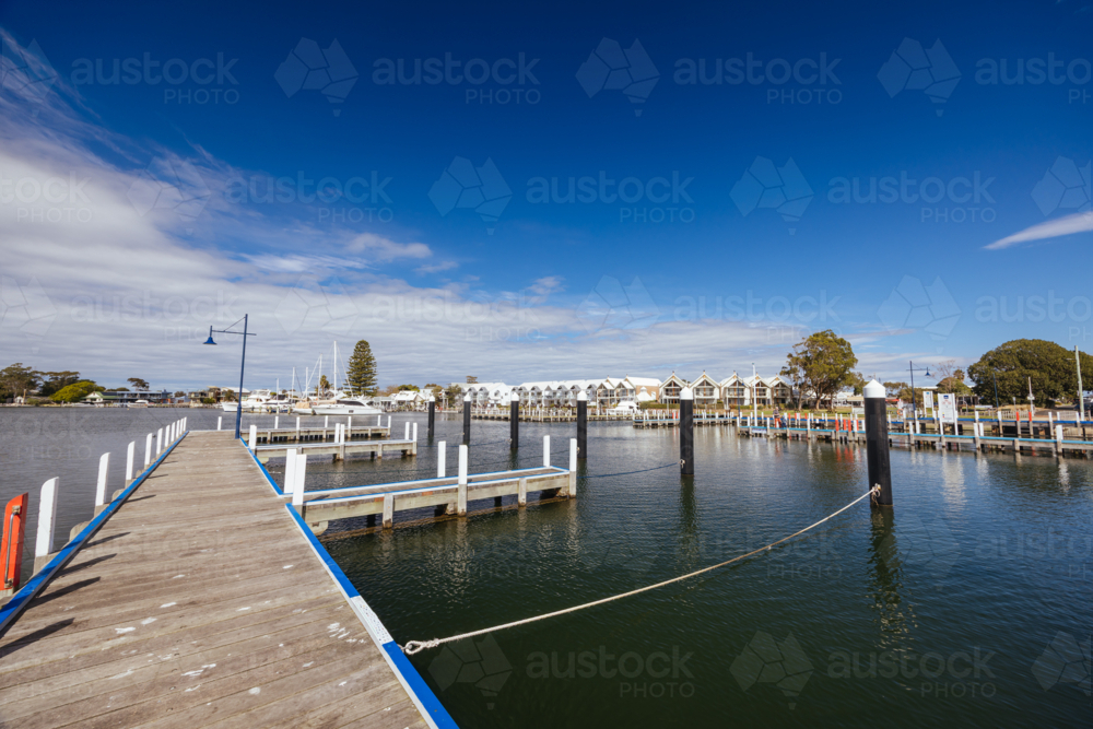 Views around Metung Wharf on a warm sunny spring day in Victoria, Australia - Australian Stock Image