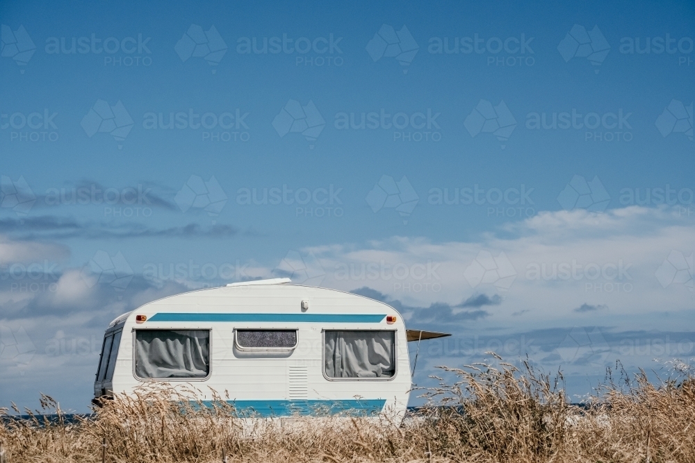 Vintage Caravan against a blue sky. - Australian Stock Image