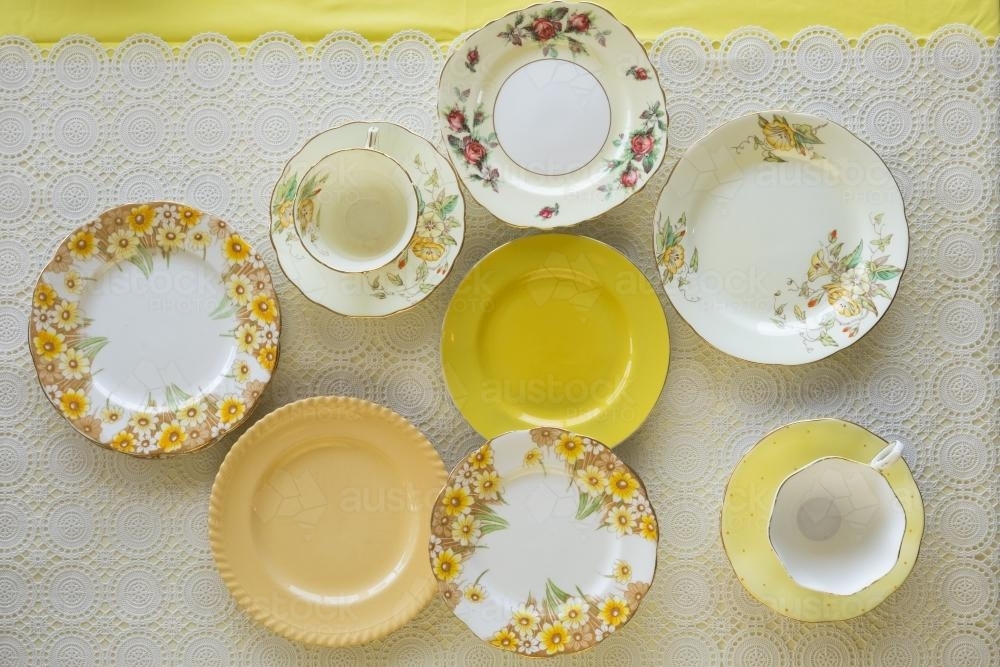 Vintage plates and teacup from overhead - Australian Stock Image