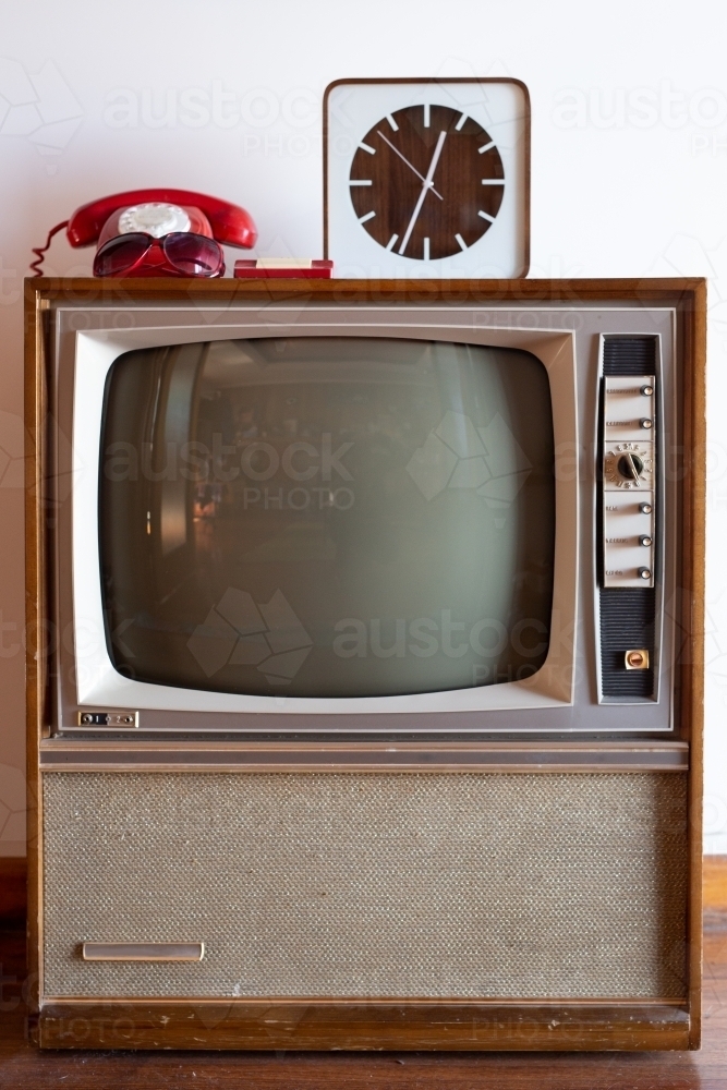 Vintage television with old phone and clock - Australian Stock Image