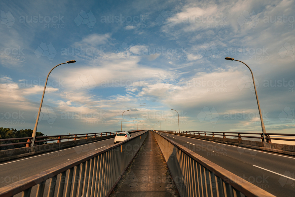 Walkway across top of Stockton Bridge between dual traffic lanes - Australian Stock Image