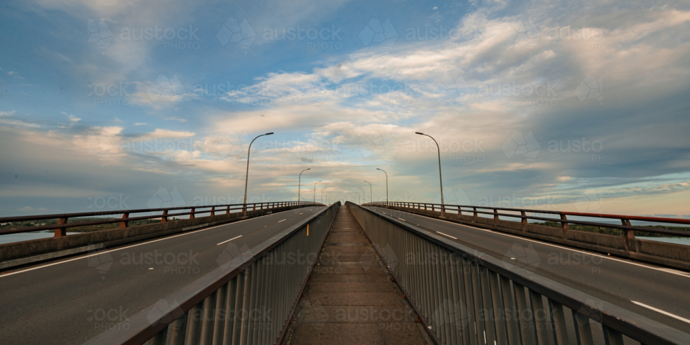 Walkway across top of Stockton Bridge between dual traffic lanes - Australian Stock Image