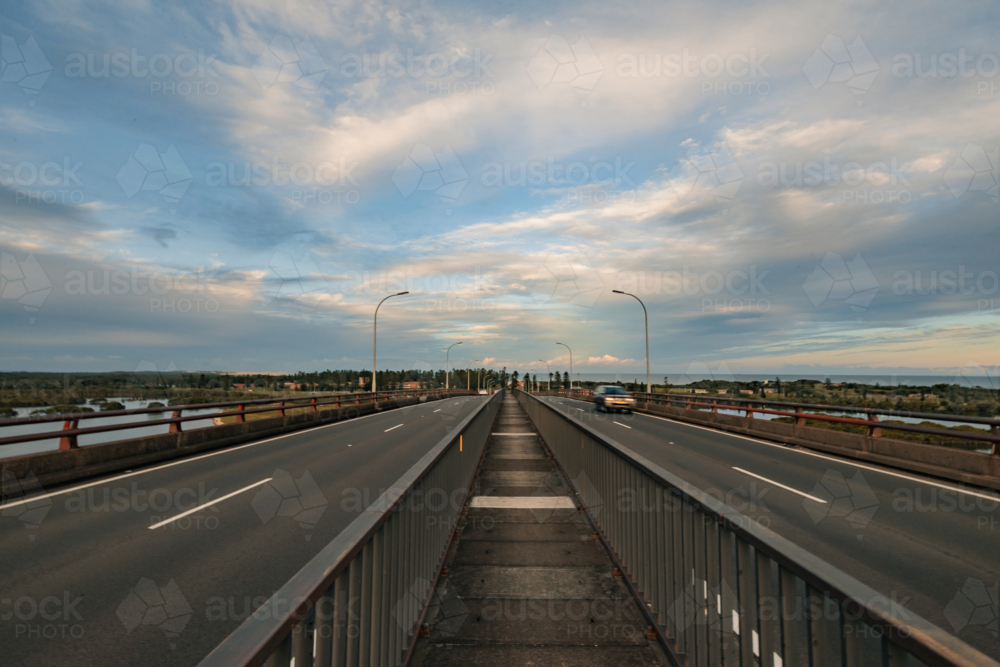 Walkway across top of Stockton Bridge between dual traffic lanes - Australian Stock Image