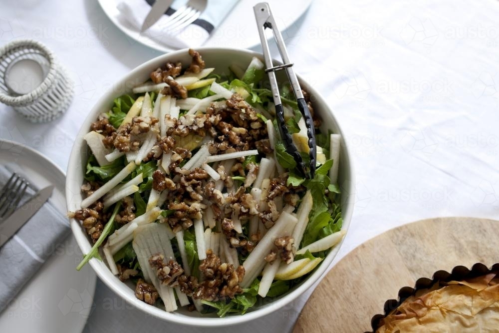 Walnut salad on table - Australian Stock Image