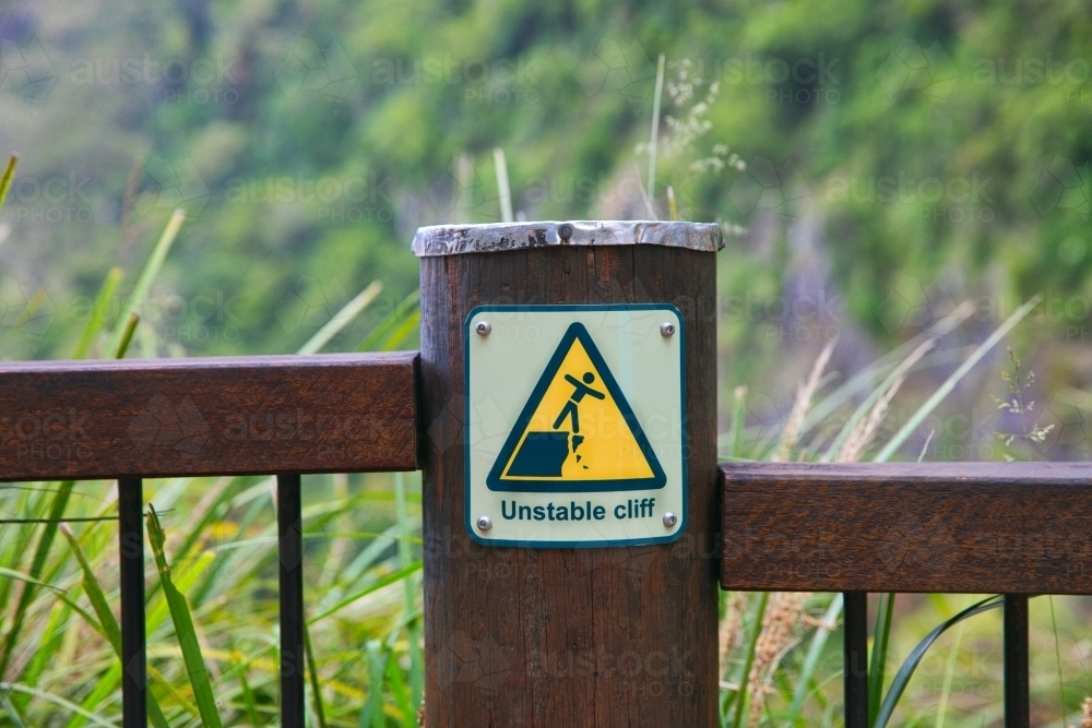 Warning sign at edge of cliff at national park - Australian Stock Image
