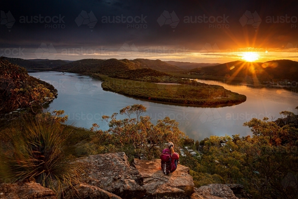 Watching a beautiful sunset over the mountains brings peace - Australian Stock Image