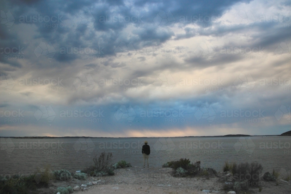 Watching the Storm Over the Water - Australian Stock Image
