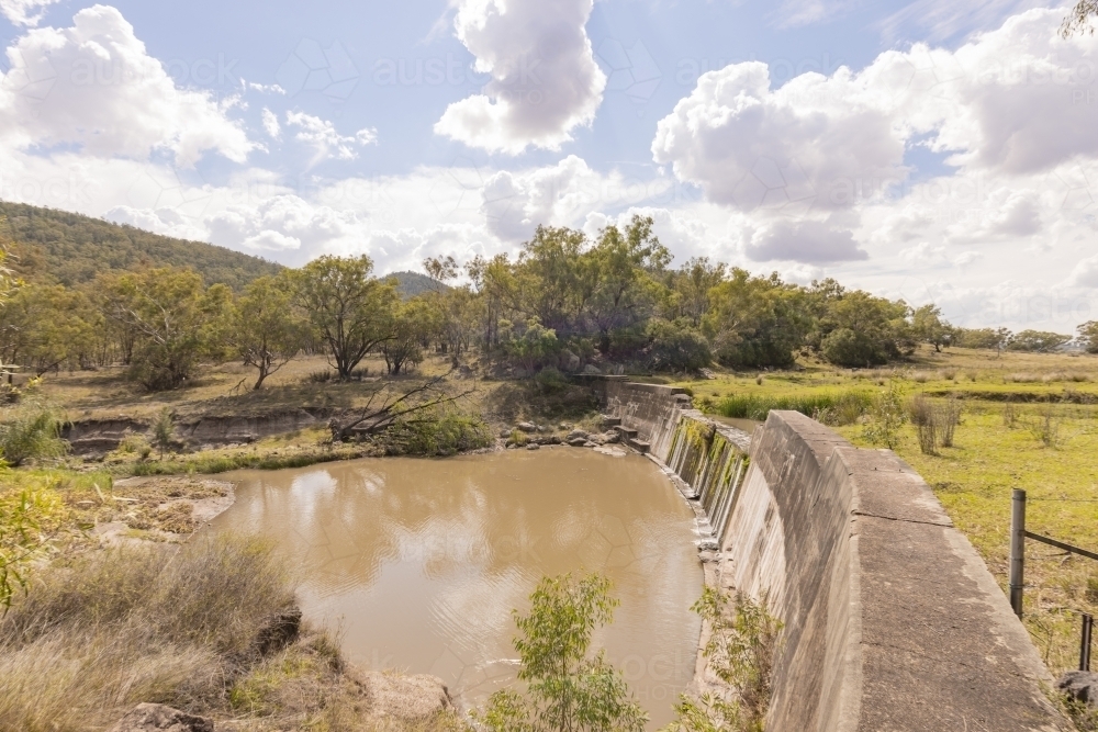 Water cascading over spillway in the Liverpool Plains NSW - Australian Stock Image